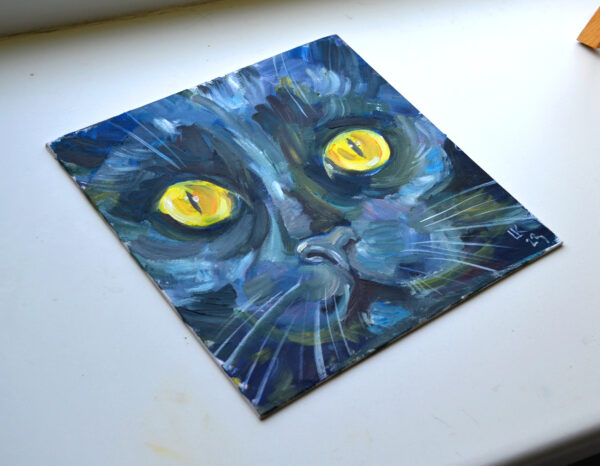 Discover the captivating charm of "Black Cat Portrait" by Lada Kholosho. This one-of-a-kind oil painting on canvas board (25x25 cm) features bold brushstrokes and mesmerizing yellow eyes. Signed and shipped with a certificate of authenticity.