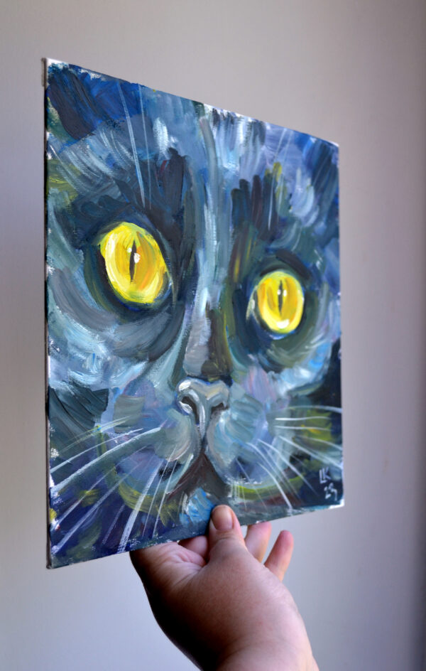 Discover the captivating charm of "Black Cat Portrait" by Lada Kholosho. This one-of-a-kind oil painting on canvas board (25x25 cm) features bold brushstrokes and mesmerizing yellow eyes. Signed and shipped with a certificate of authenticity.