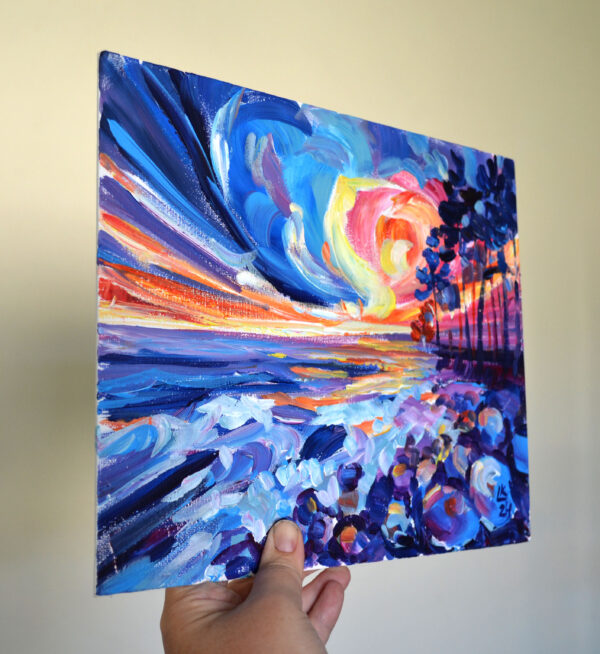 Experience the vibrant energy of a Baltic sunset with this one-of-a-kind acrylic artwork by Lada Kholosho. Bold brushstrokes and vivid colors capture the raw beauty of nature.