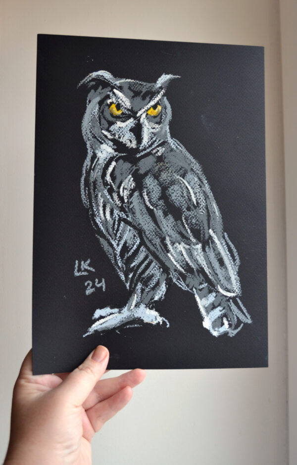Original oil pastel painting "Great Horned Owl on Black" by Lada Kholosho – bold and dynamic wildlife art, featuring a fierce owl with piercing yellow eyes against a deep black background.