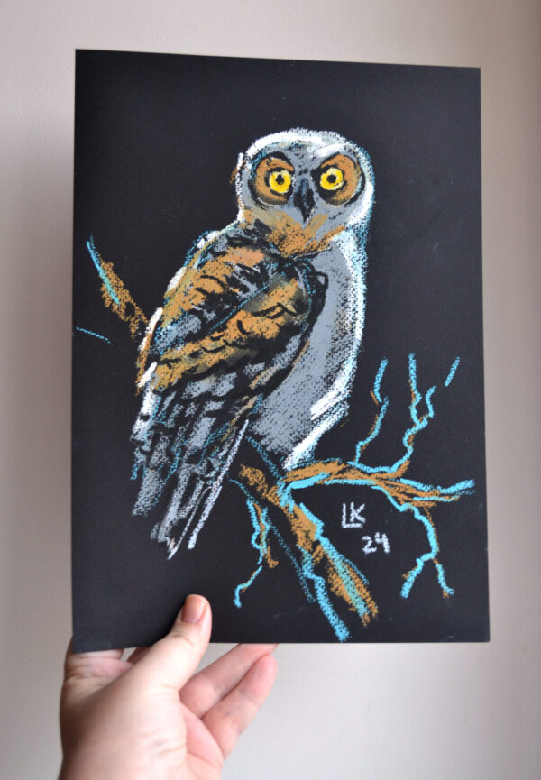 Original oil pastel painting "Owl on a Branch" by Lada Kholosho – expressive wildlife art featuring a curious owl with vivid yellow eyes against a deep, dark background.